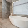 Bathroom - bath Penny Homes Showhome - Kokomea Park, Taupo