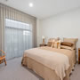 Bedroom - earth tones Penny Homes Showhome - Kokomea Park, Taupo